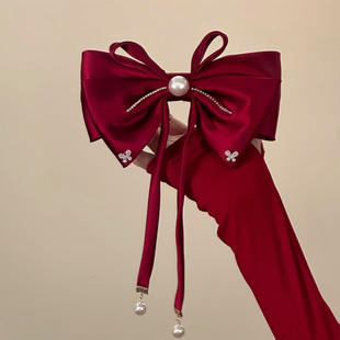 沦陷了~氛围感红色缎面蝴蝶结发夹高级感飘带弹簧夹新年旅行发卡