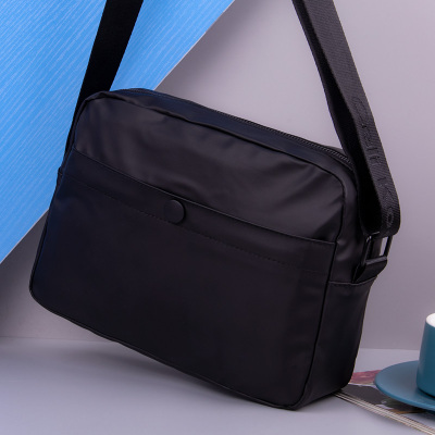 新款单肩包男学生大容量