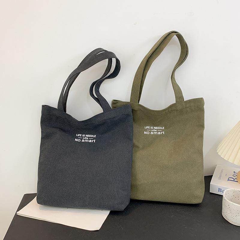 帆布包带拉链封口质感大容量简约托特包通勤慵懒松弛感单肩手提