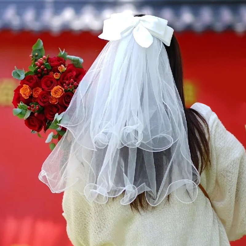 白色蝴蝶结头纱领证求婚订婚婚礼新娘轻婚纱高级感饰品发夹短款图片