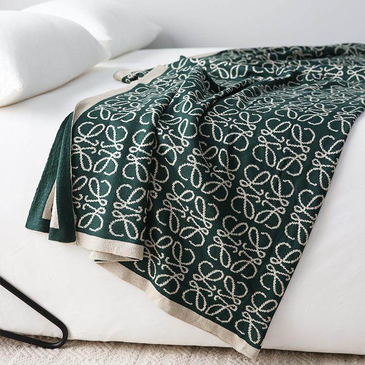 美式针织毯春秋橘色盖毯细织毛毯装饰样板间民宿床尾巾毯工厂现货