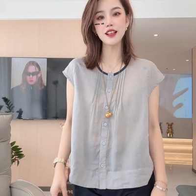 法式复古高级感圆领无袖衬衫女2025夏季新款设计感小众单排扣上衣