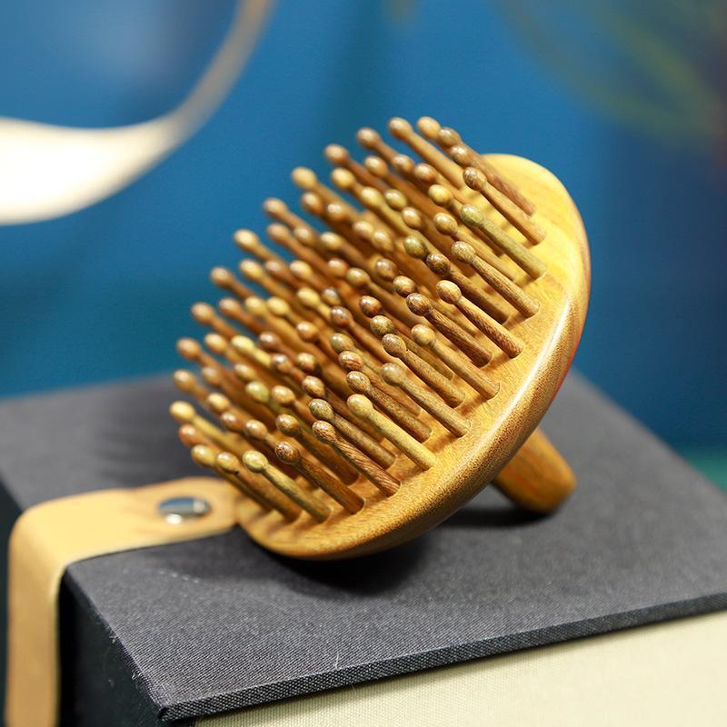 绿气囊梳 指环按摩梳檀木梳梳子气垫梳齿经络头部81家用万百子