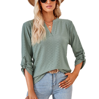 Solid color three-quarter sleeve buttoned loose T-shirt