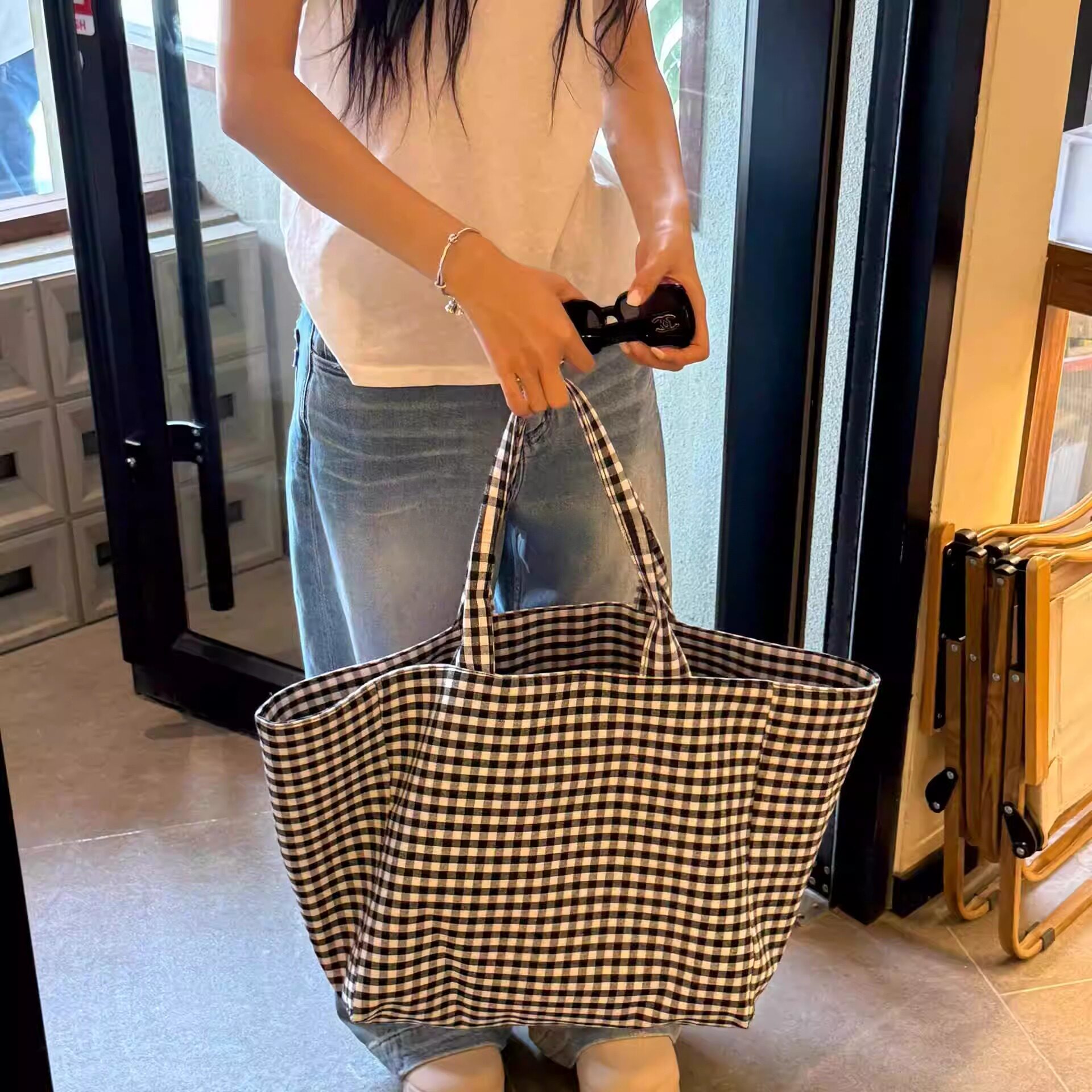 韩版慵懒感通勤大托特包黑白格单肩收纳购物袋帆布2025新款大容量