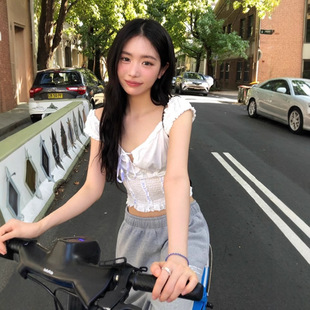 The 韩国东大门甜美撞色木耳边格纹露脐吊带背心 Barnnet现H25夏款