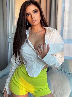 ebay2022欧美辣妹短款不规则弧形下摆衬衫女收腰显瘦褶皱纽扣上衣