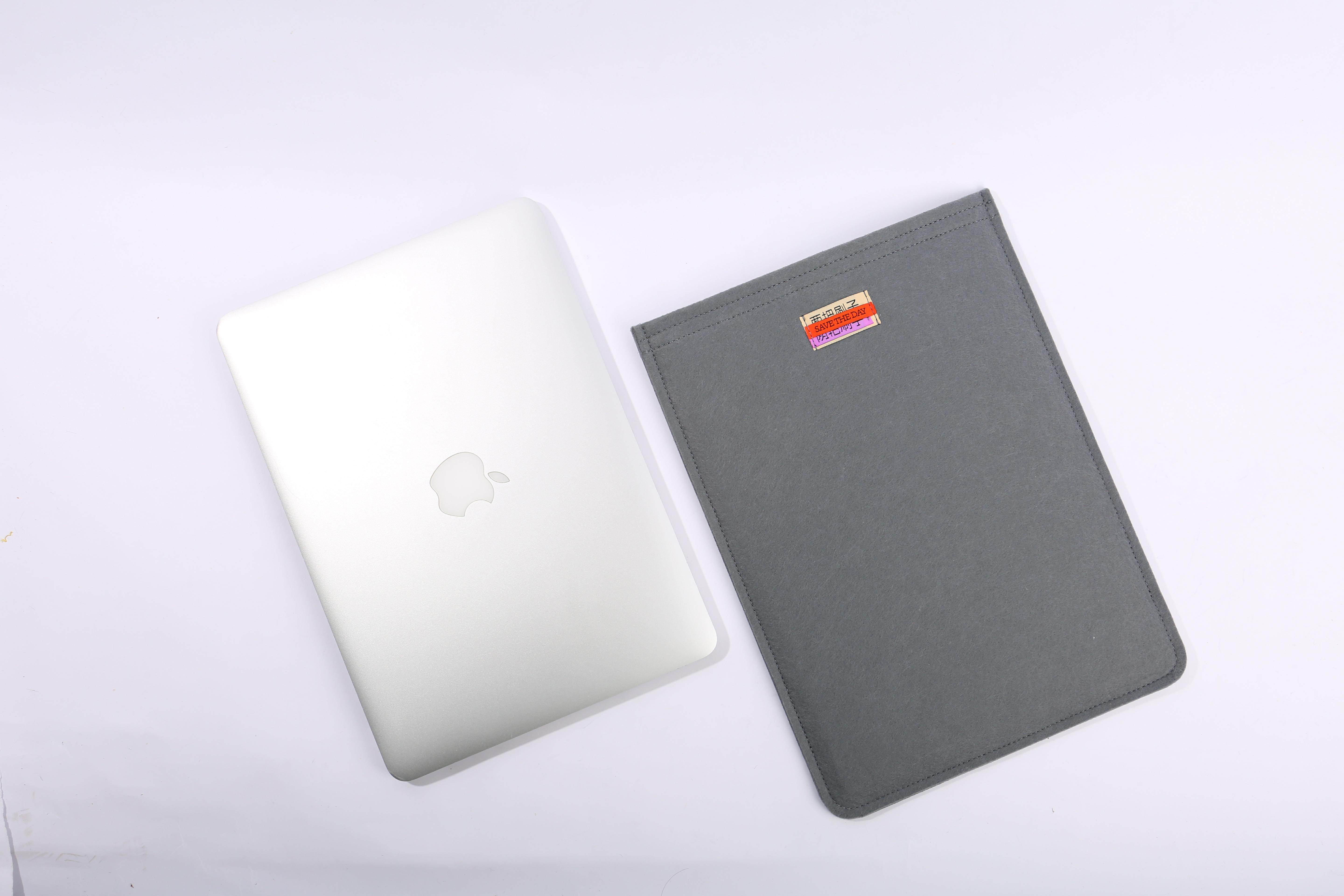 包拯适应于笔记本电脑内胆包毛毡收纳包两把刷子定制