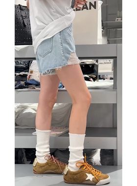 秒发诗歌兰58330时髦百搭浅蓝色破洞毛边牛仔短裤25秋季新款女装