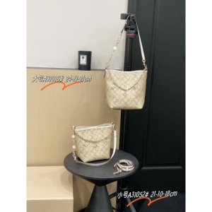 优草坊正品品牌女包2026新款水桶包米白开口笑小众时尚链条百