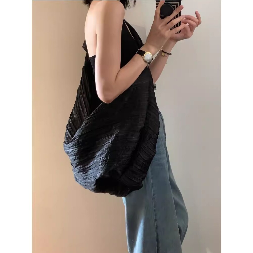 帆布包包女2026新款小众设计慵懒风通勤托特大容量休闲云朵斜挎包