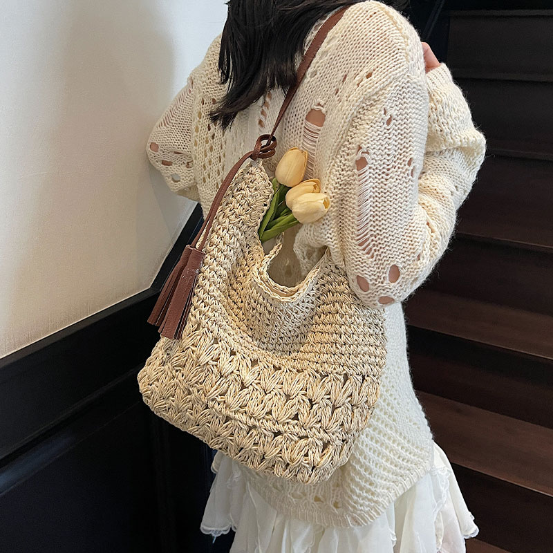 夏天镂空流苏草编包女新款海边度假风沙滩包大容量编织单肩托特包