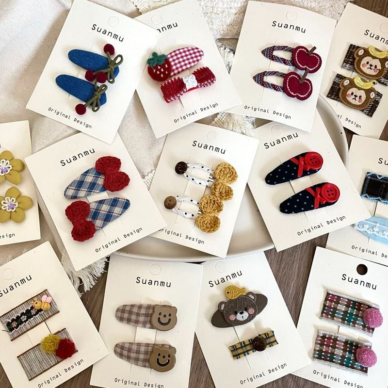 甜美毛线蝴蝶结草莓纽扣儿童发夹