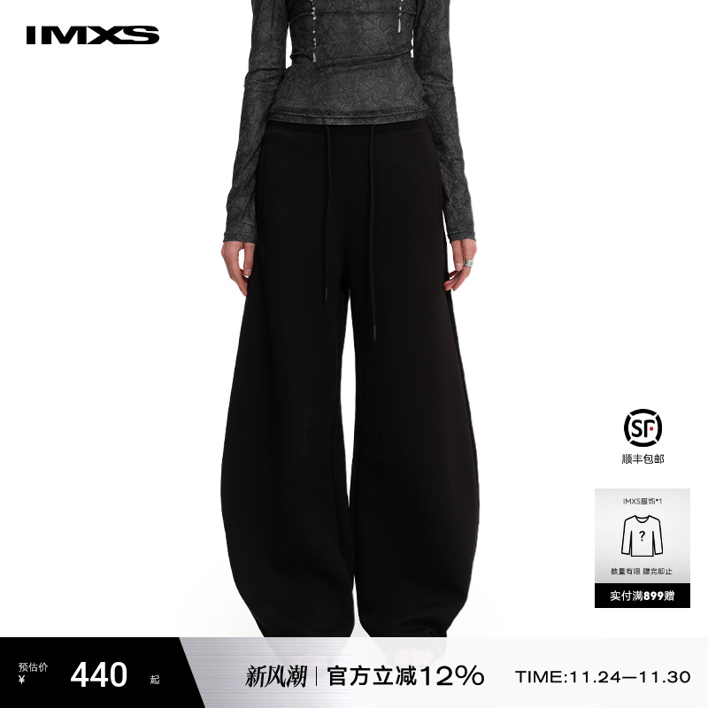 松弛感简约弧形弯刀裤子女卫裤