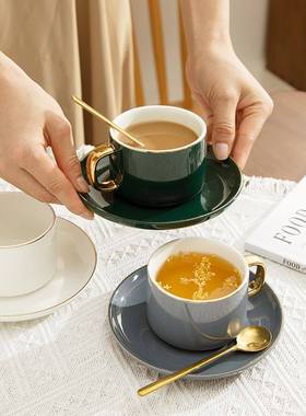 Classic ceramic coffee cup with gold handle creative design