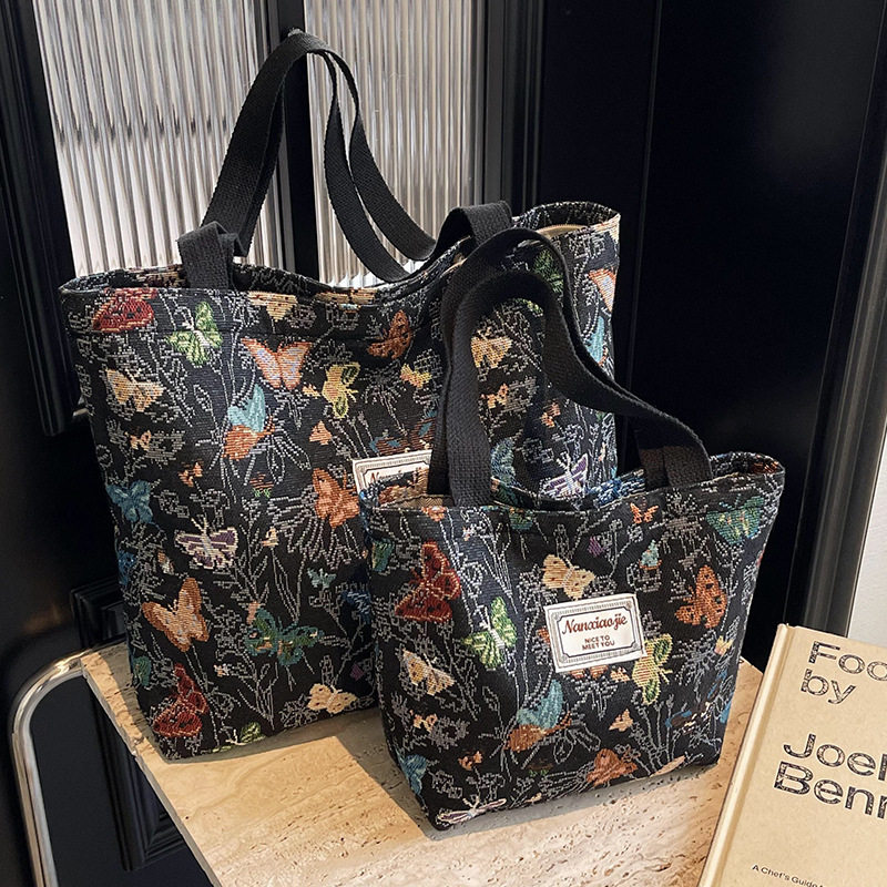 大容量蝴蝶帆布包包2024新款通勤托特包女ins时尚外出单肩妈咪包