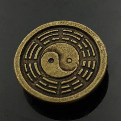 Brass Two Bulls Spinning On A Copper Plate Means Turn