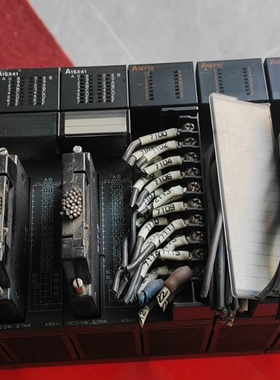 议价三菱PLC拆机套装，型号A1S63P，包含多个扩展模块。设备