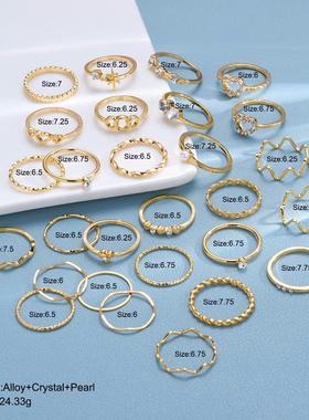 Love Wave28 piece set of gold joint rings
