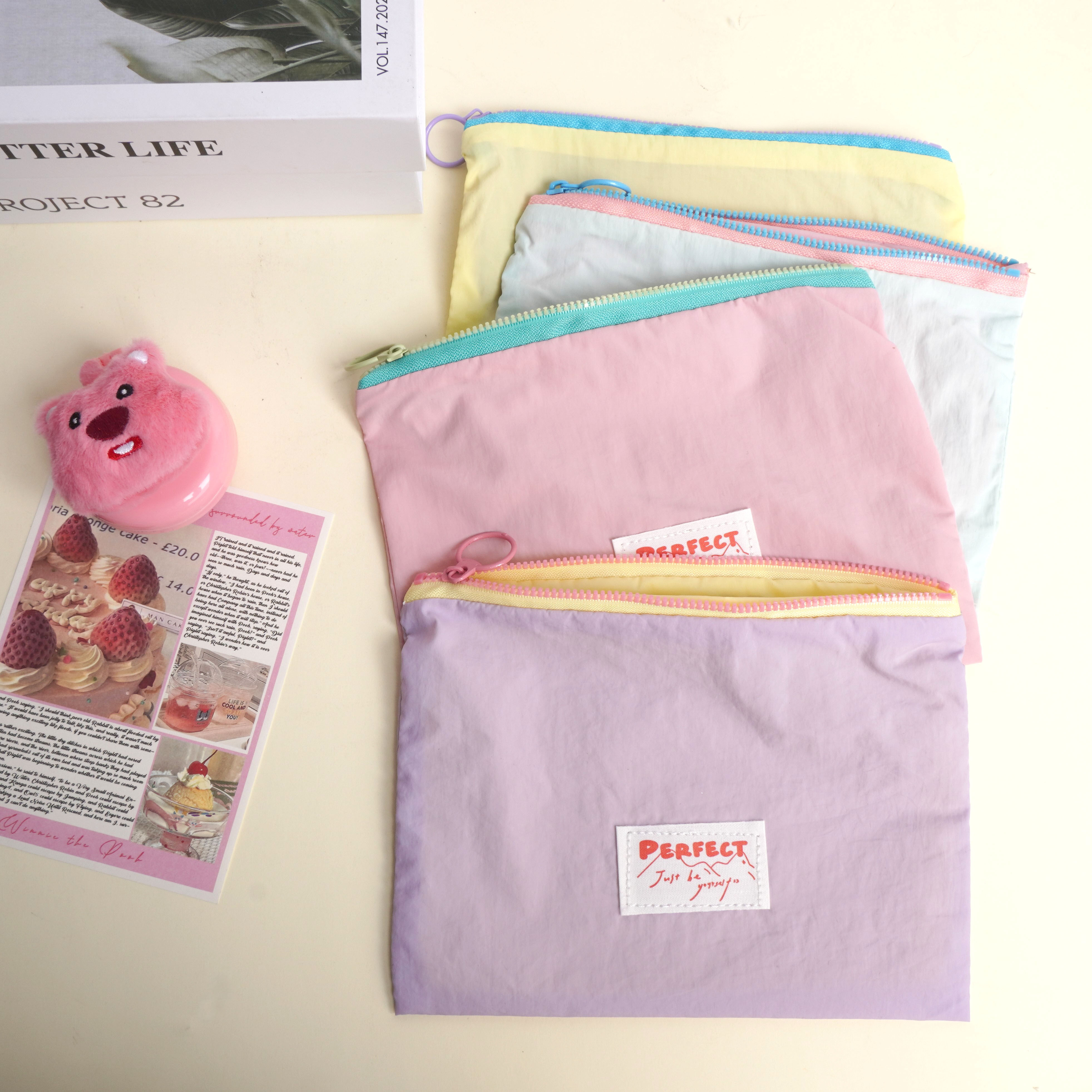 ins化妆收纳包女旅行便携马卡龙撞色数据线口红收纳袋高颜值小包