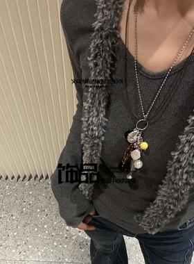 义乌市陌然饰品有限公司乌托邦系列金属海螺流苏长款小众设计黑猪