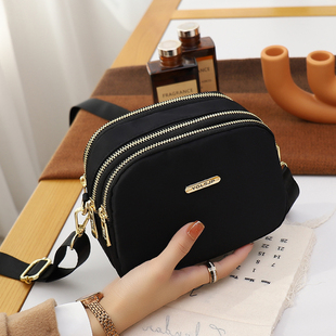 牛津布包女斜挎2025新款休闲通勤宽肩带多层小包包轻便百搭单肩包