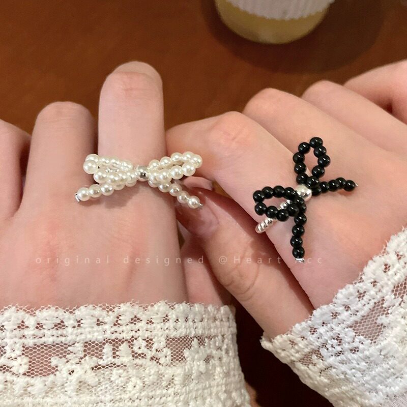 蝴蝶结弹力绳珍珠戒指少女甜美食指戒轻奢高级感小众设计韩系指环