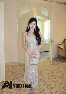 2025新款流光银亮片法式高端轻奢小众吊带连衣裙气质收腰包臀礼服