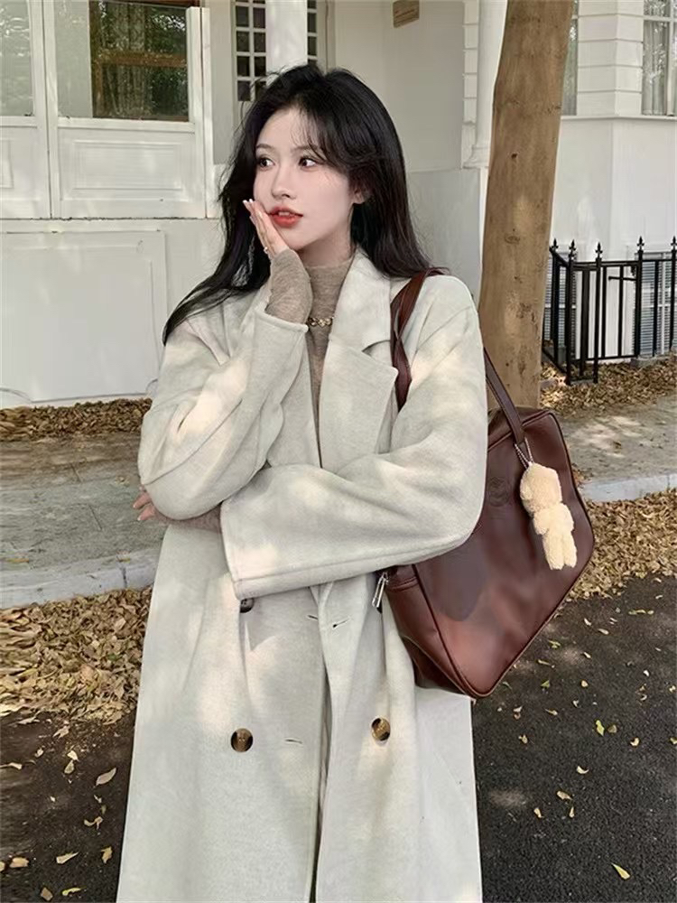 十三行2025韩系时尚设计感小众双排扣宽松休闲90羽绒风衣外套大衣