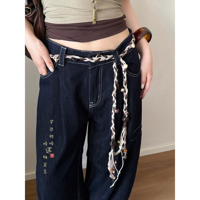 咖色编织流苏腰带配牛仔裤腰链