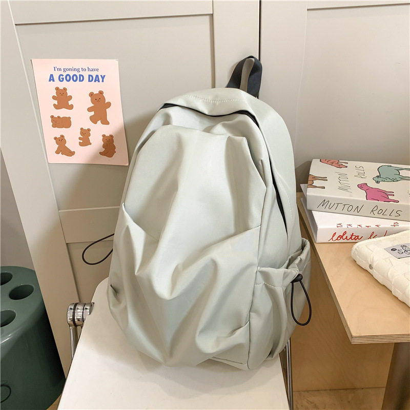 韩版百搭纯色褶皱双肩包男女通用