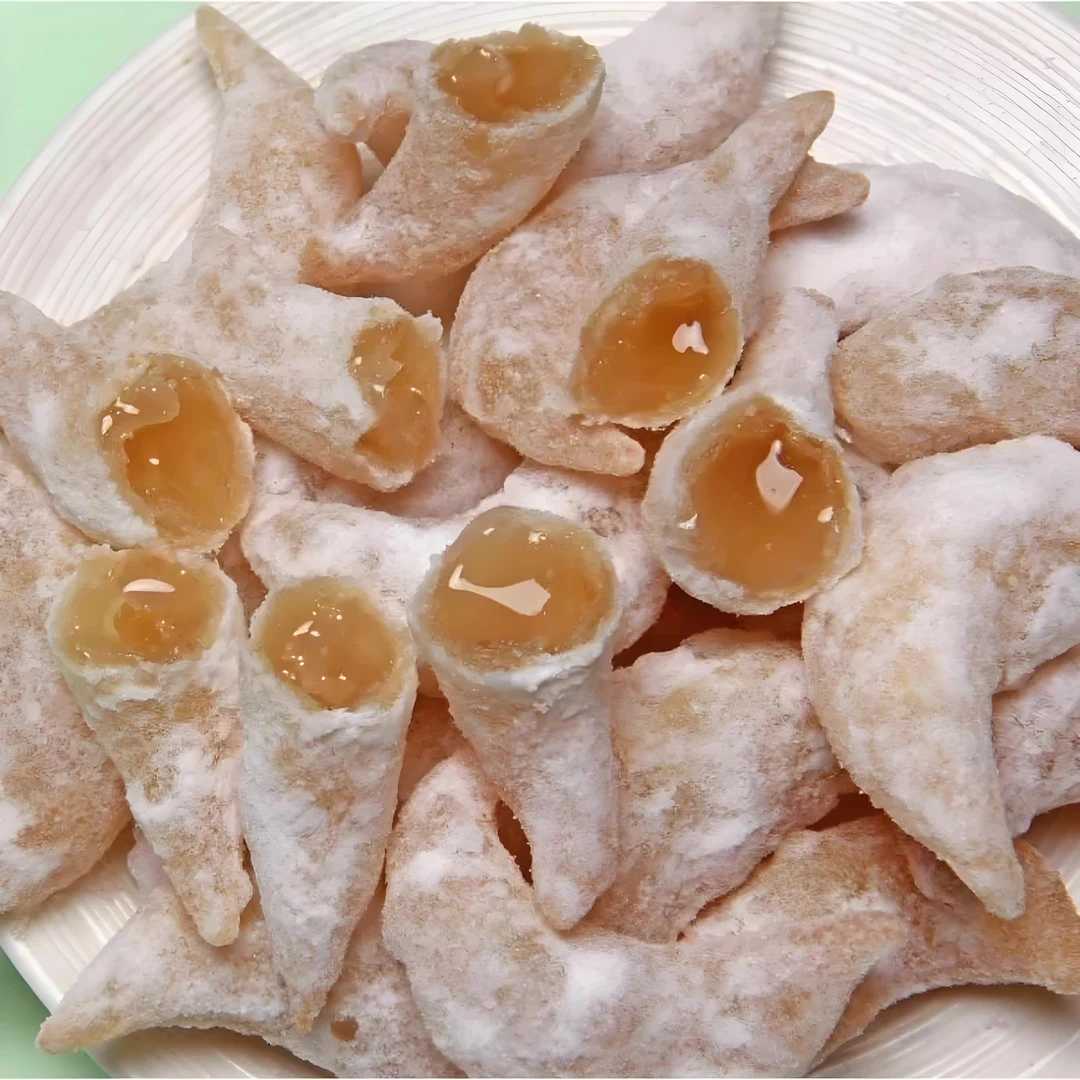 河南羊角蜜正宗蜜糖角组合价灌浆果子月亮果梅豆角糖心糕点夹心