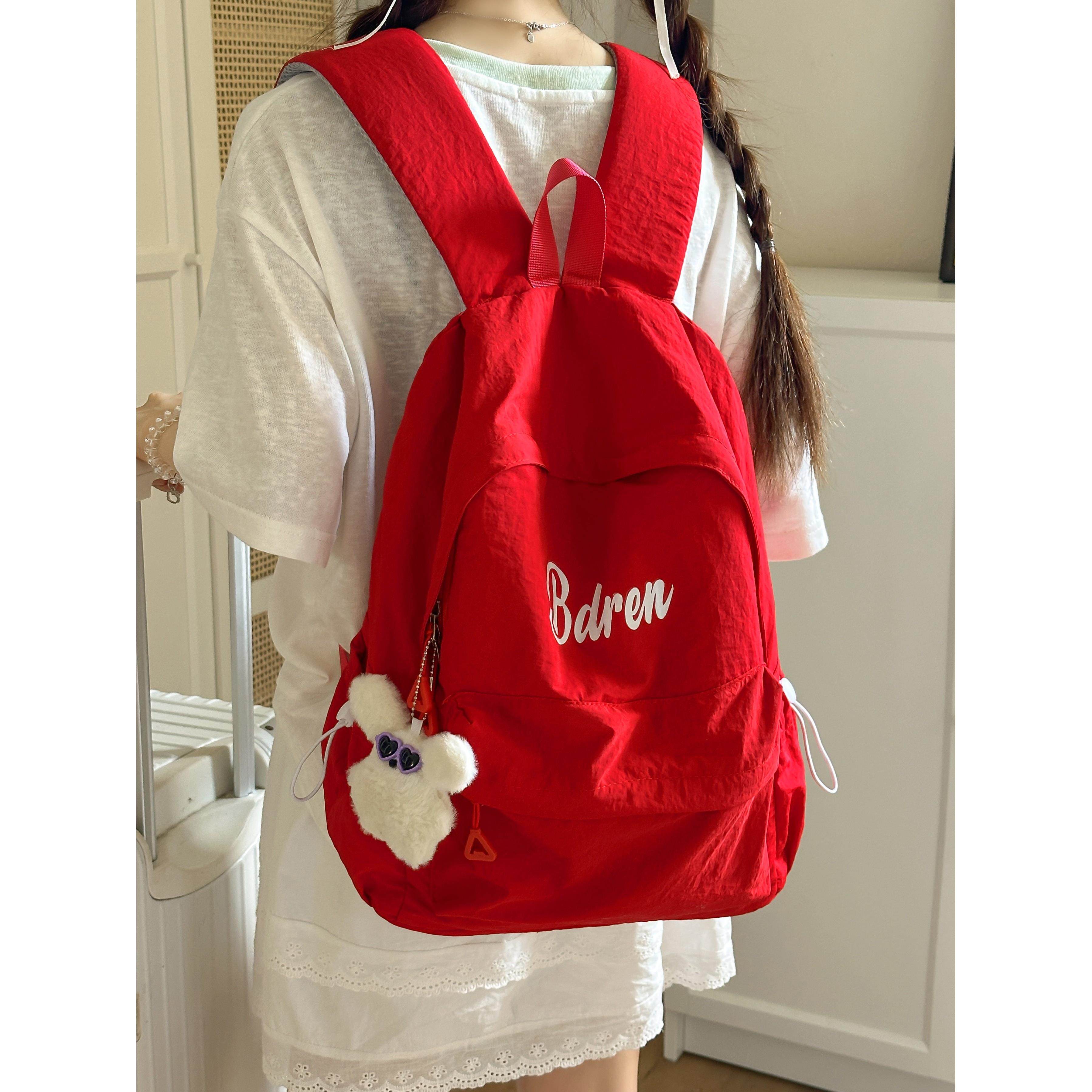 红色书包高中生女大学生韩系高颜值轻便女生通勤背包双肩包肩包