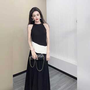 [情有独钟]网红同款法式假两件拼接挂脖背心短袖上衣半身裙两件套