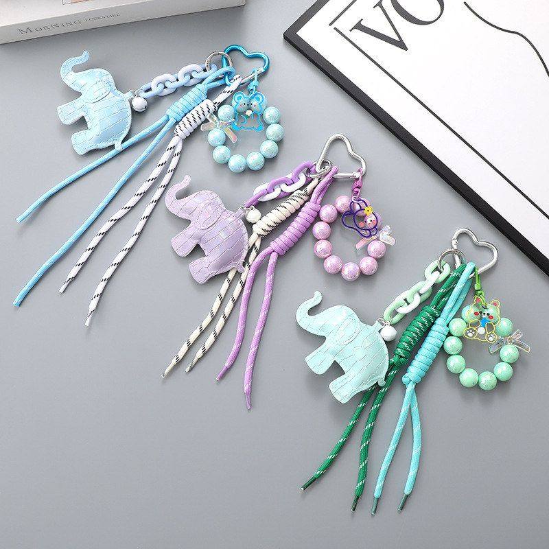 新款人鱼姬串珠手机挂件miu系包包挂饰配件卡通公仔皮革大象挂饰,节庆用品/礼品,挂饰/生肖挂饰,淘宝优惠券,粉丝福利购,淘宝优惠卷