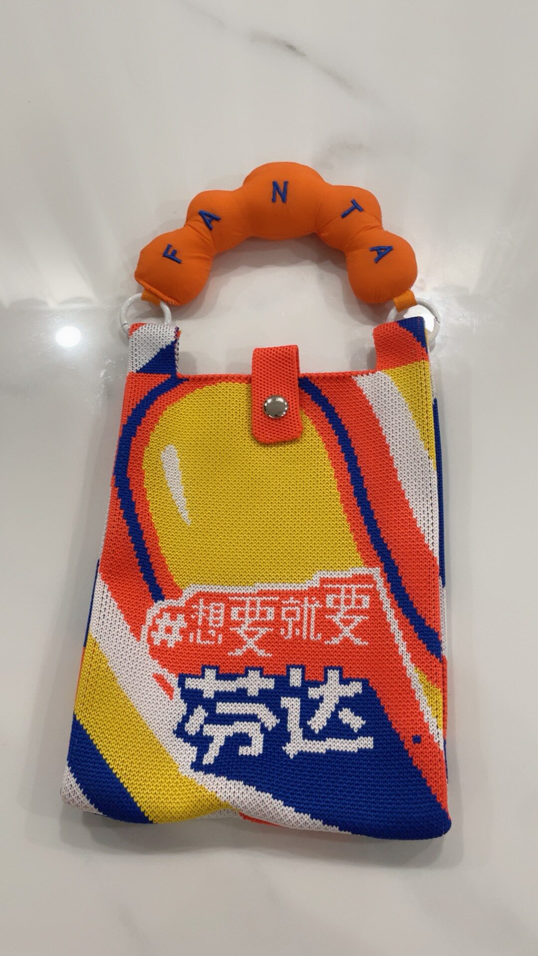 橘色手包袋子品牌礼品针织包手拎包小包聚酯纤维手腕包