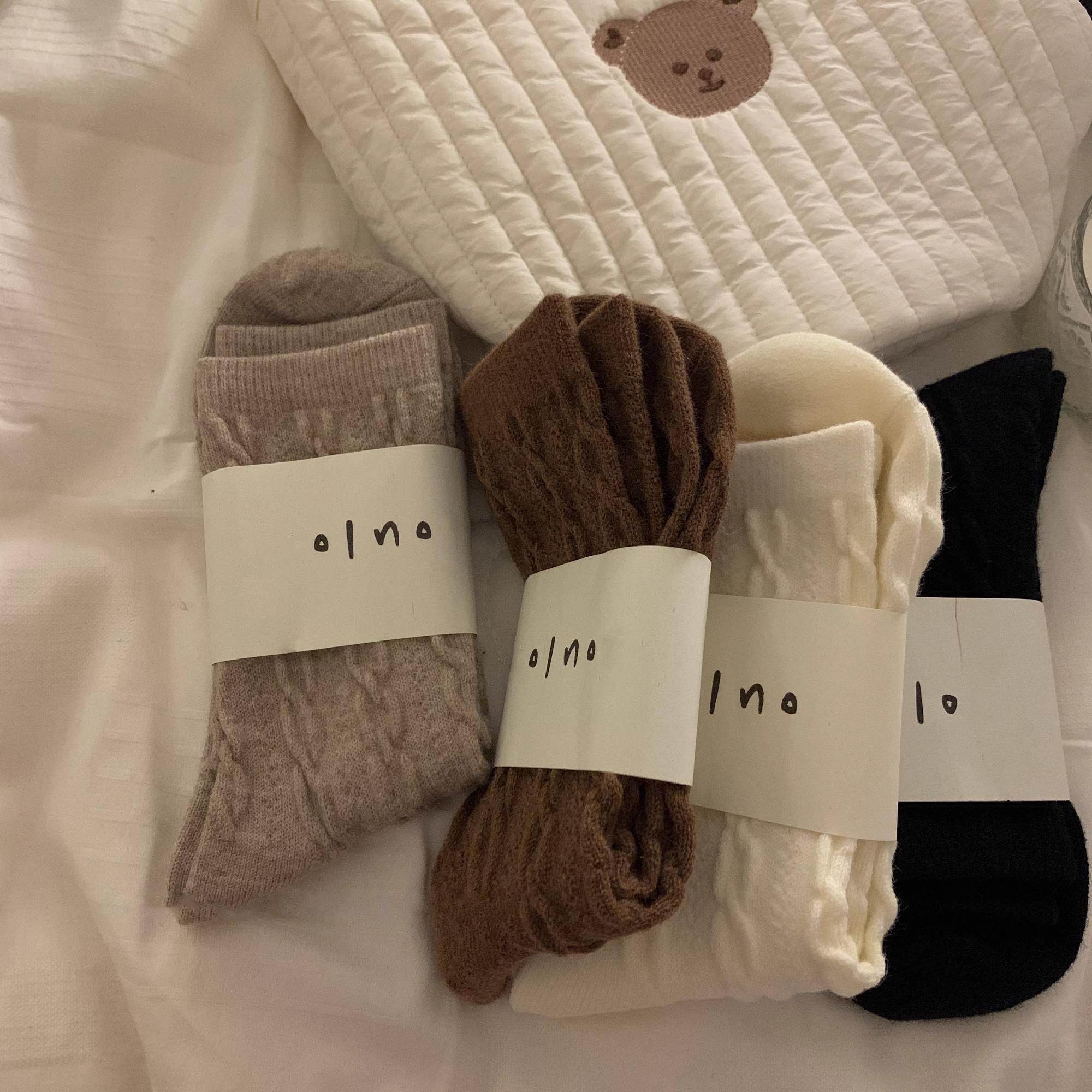 韩系麻花羊毛袜子女中筒袜秋冬保暖加厚百搭纯色堆堆袜ins风