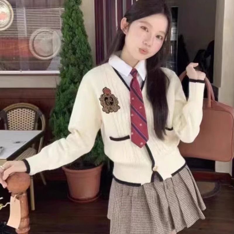 香港潮牌蜜妃兒學(xué)院風(fēng)假兩件長(zhǎng)袖針織毛衣女設(shè)計(jì)感修身顯瘦減齡上