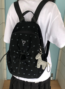 Unique blue 韩系爱心大容量轻便双肩包女学生书包旅行通勤背包
