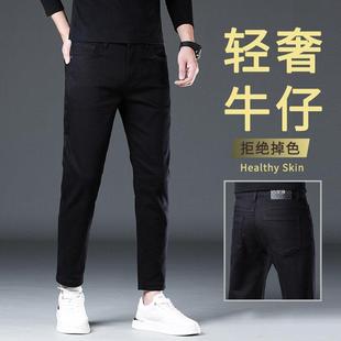 香港黑色牛仔裤男款冬季加绒加厚修身小脚九分裤子秋冬款休闲男裤