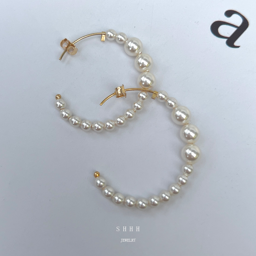 正圆强光施家珍珠圆圈耳环