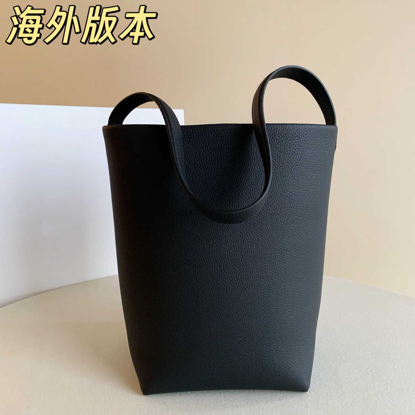 【头层牛皮】极简风托特包 大容量通勤水桶包 高级感百搭单肩包,箱包皮具/热销女包/男包,水桶包,淘宝优惠券,粉丝福利购,淘宝优惠卷