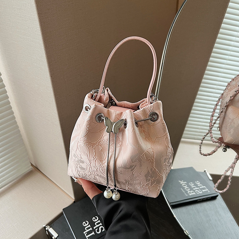 国风压花水桶包新款抽绳