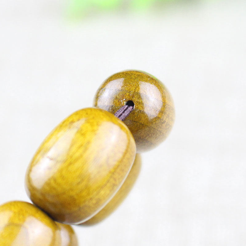 厂家四川金丝楠木手串个性老桶珠男女木质文玩黄绿料单圈手链