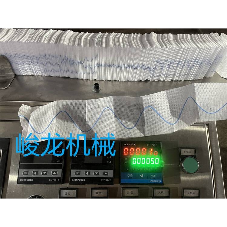 带X光止血棉片折叠机带加液烘干壳聚糖止血纱布折叠机制造
