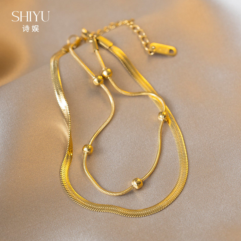 2024新款双层蛇骨轻奢简约脚链女金色钛钢脚饰气质小众不褪色足链