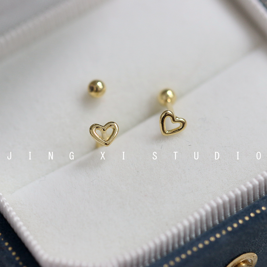 S925纯银极简镂空爱心拧螺丝耳钉