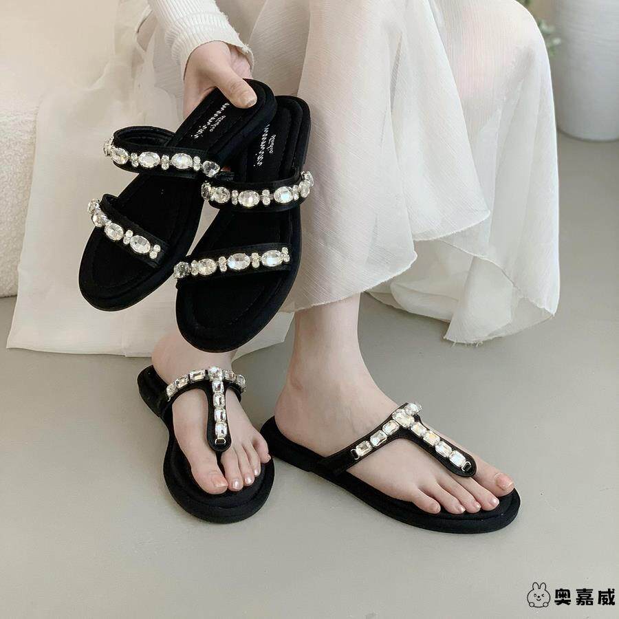 黑色平底高级感水钻一字凉拖鞋女秋季外穿新款配裙子夹趾沙滩凉鞋