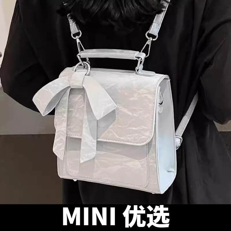 蝴蝶结多用双肩背包女2025新款潮时尚学院风百搭手提包旅行高级感