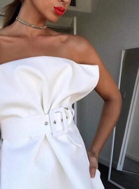 A sleeveless top with a flounces